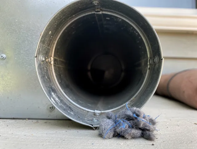 Valle Vista Dryer Vent Cleaning technician using specialized equipment to clear severe dryer vent blockage in Valle Vista